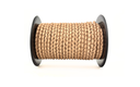 Spool of beige braided leather cord on a white background