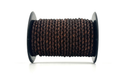 Spool of dark brown braided leather cord on a white background