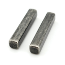 Two antique silver bar objects on a white background