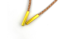 Bar bolo tie tips in gold finish, enhancing stylish bolo tie accessories for a polished look.