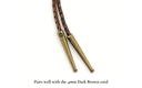 Helio - sun motif bolo tie tips in bronze finish shown with braided dark brown cord.