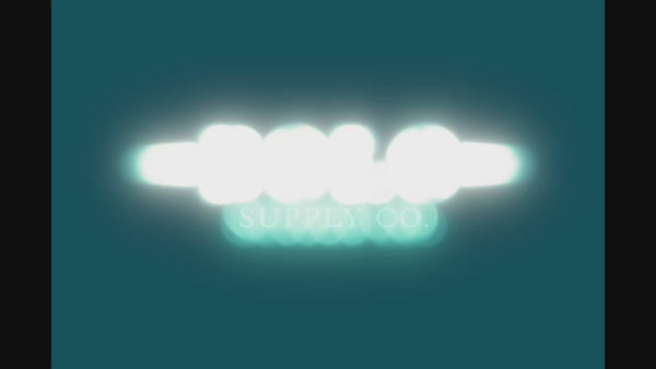 Premium Bolo Tie Kit - Turns Any Flat Object Into a Bolo Tie logo with stylish glow effect.